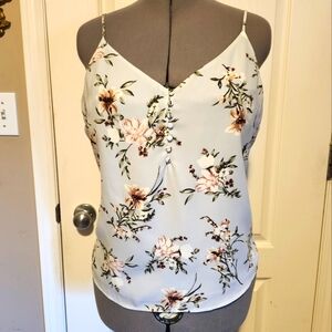 Dynamite blue floral blouse in size Large NWT